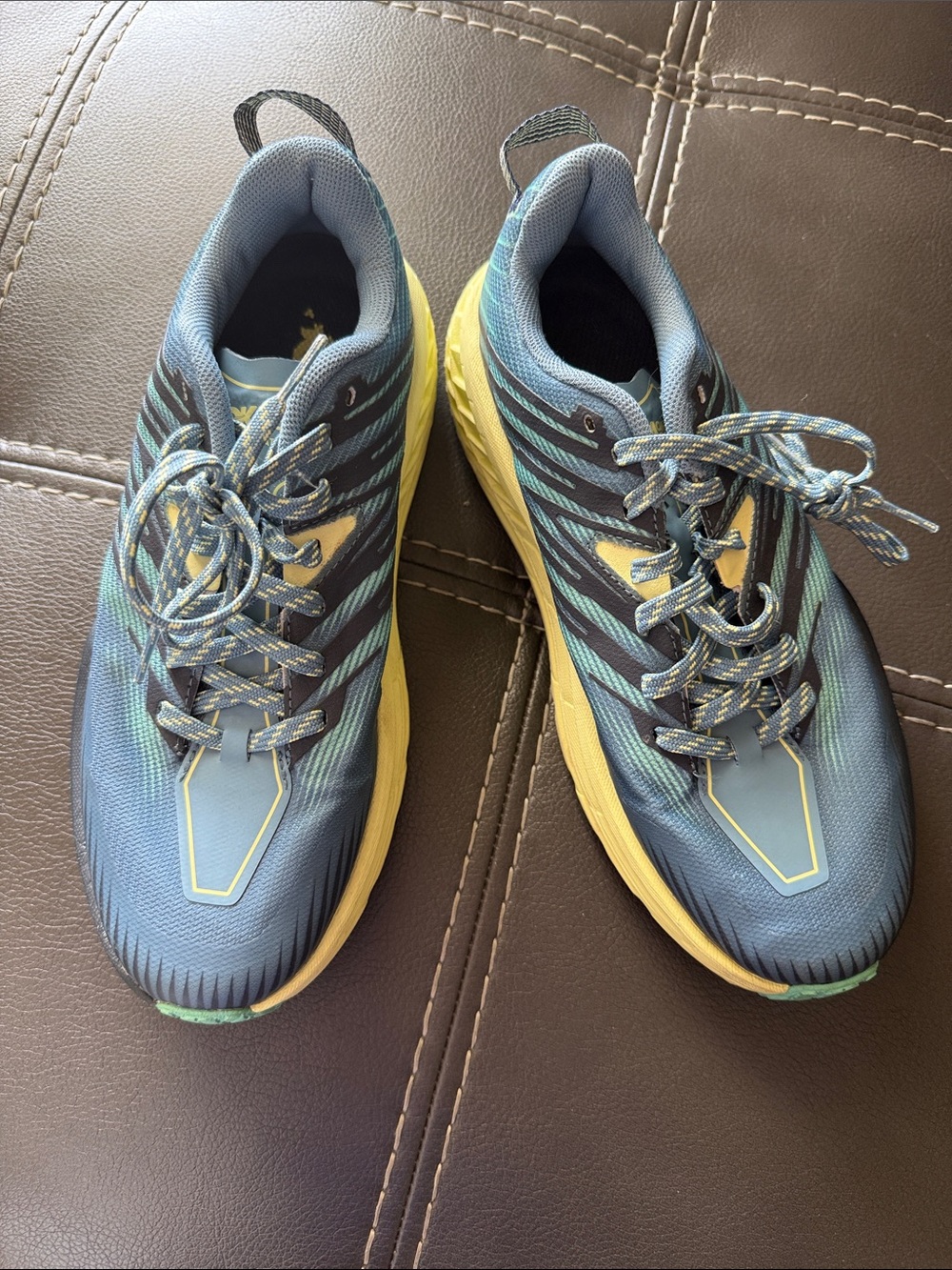 Hoka Men's Athletic Shoes in Blue with Yellow Soles